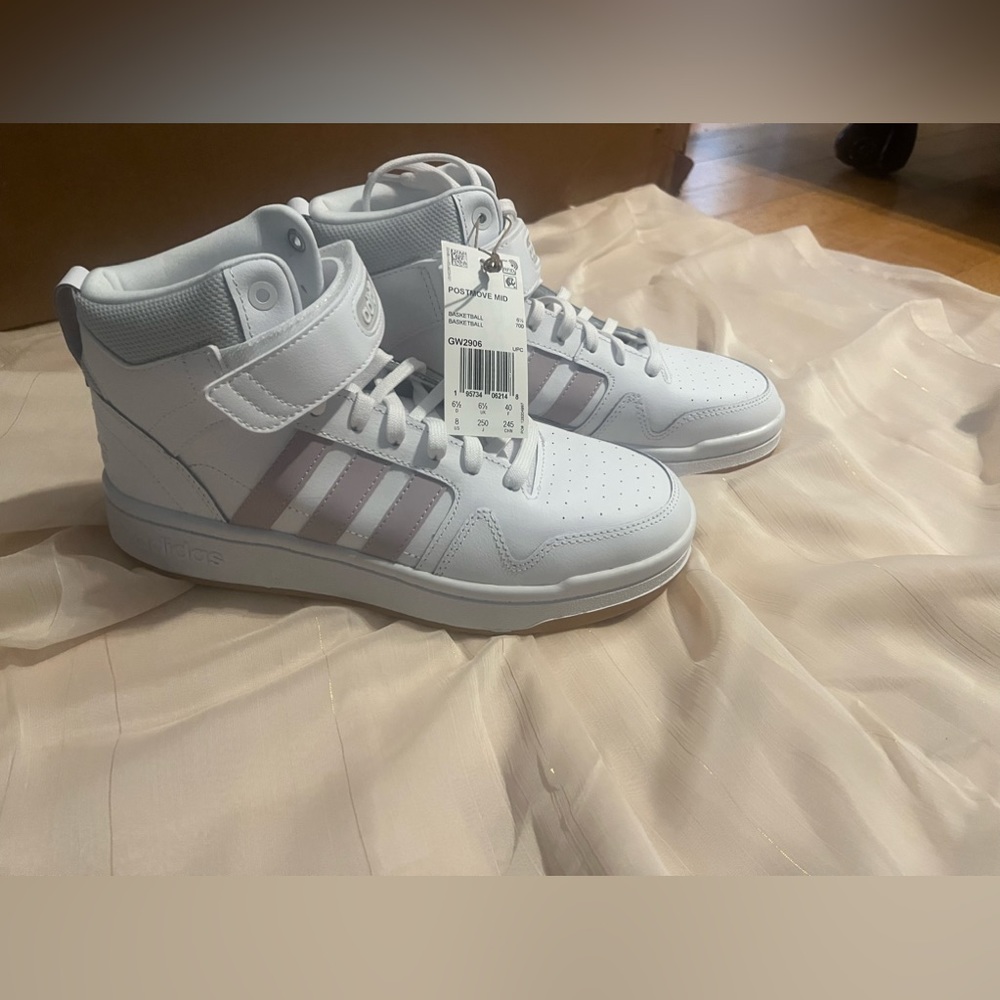 Adidas basketball brand new sneakers with tags.